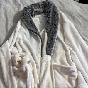 White furry robe with grey collar